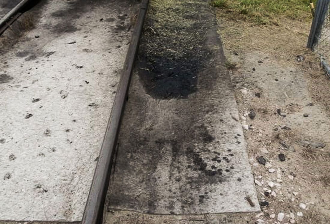 polymer backing prevents oil from hitting the ground
