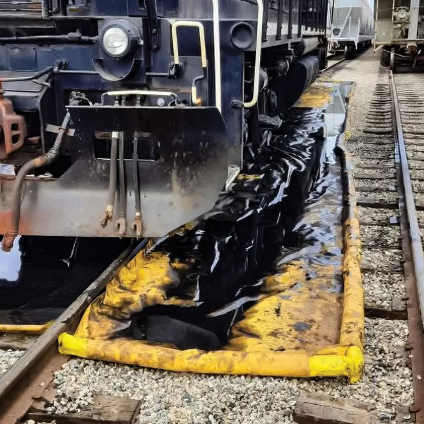 Train washdown berm